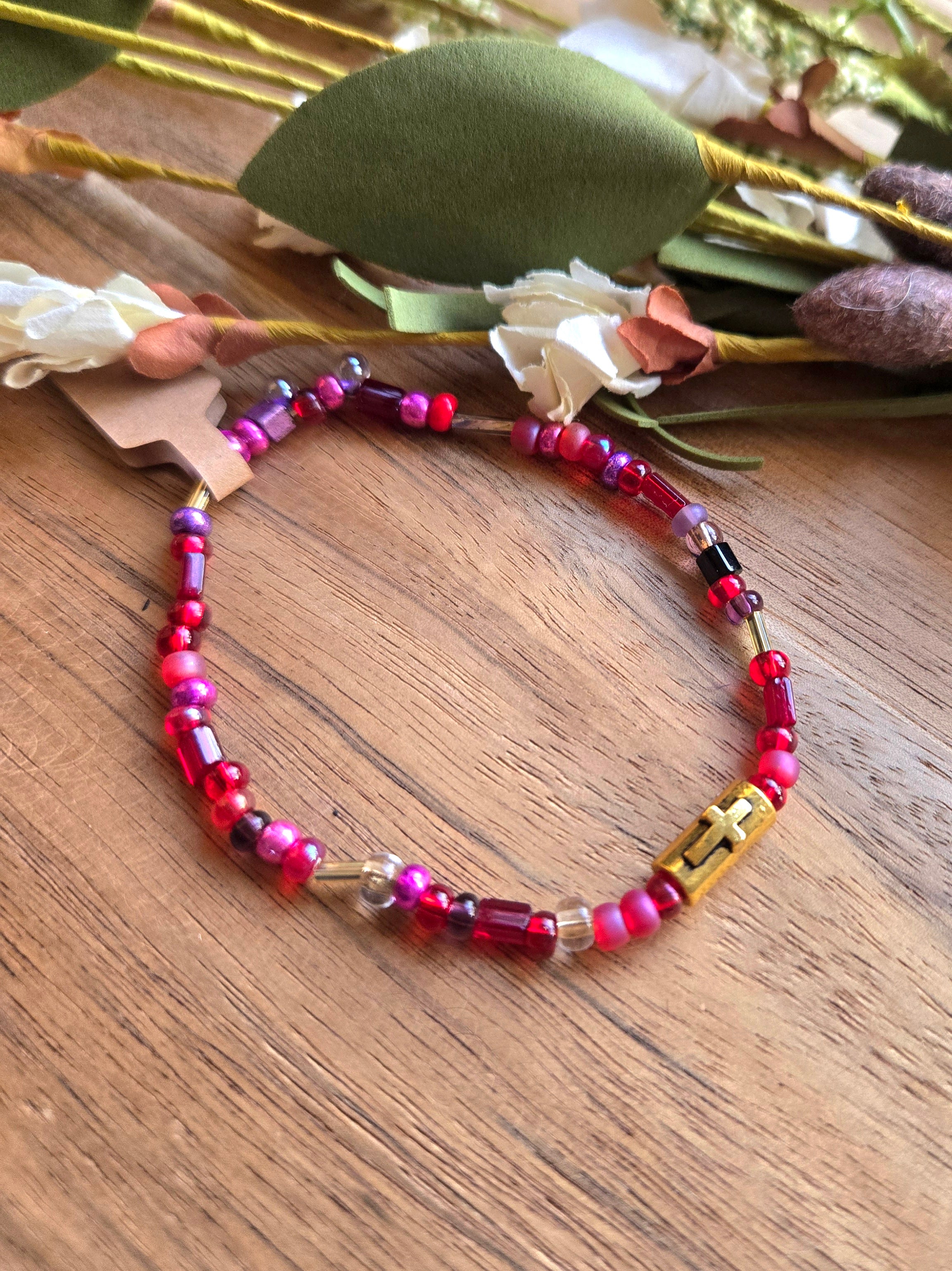 Overflowing Joy Seed Bead Cross Bracelet