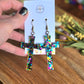 Radiant Faith Cross Earrings - Dark Confetti